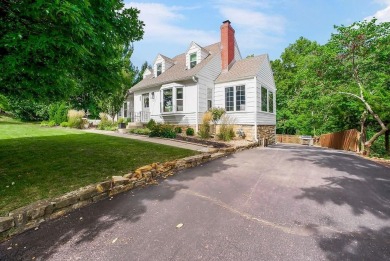 Inside the Private Gates of Lake Quivira! Discover this charming on Lake Quivira Country Club in Kansas - for sale on GolfHomes.com, golf home, golf lot
