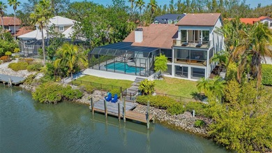 Coastal elegance meets island living in Bay Isles Bayou on on Longboat Key Golf Club Resort in Florida - for sale on GolfHomes.com, golf home, golf lot