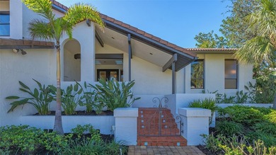 Coastal elegance meets island living in Bay Isles Bayou on on Longboat Key Golf Club Resort in Florida - for sale on GolfHomes.com, golf home, golf lot