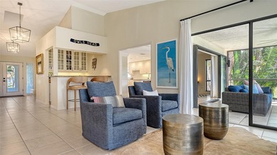 Coastal elegance meets island living in Bay Isles Bayou on on Longboat Key Golf Club Resort in Florida - for sale on GolfHomes.com, golf home, golf lot