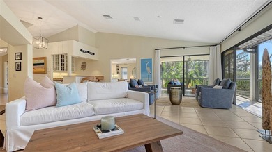 Coastal elegance meets island living in Bay Isles Bayou on on Longboat Key Golf Club Resort in Florida - for sale on GolfHomes.com, golf home, golf lot