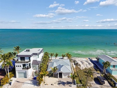 Fully updated, beach front stunner! Situated on the highly on Key Royale Club in Florida - for sale on GolfHomes.com, golf home, golf lot
