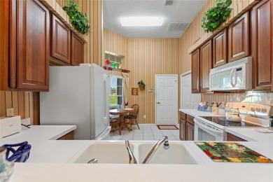 Under contract-accepting backup offers. New ROOF will be on Ridgewood Lakes Golf and Country Club in Florida - for sale on GolfHomes.com, golf home, golf lot