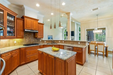 One or more photo(s) has been virtually staged. Elegant Pool on Haile Plantation Golf and Country Club in Florida - for sale on GolfHomes.com, golf home, golf lot