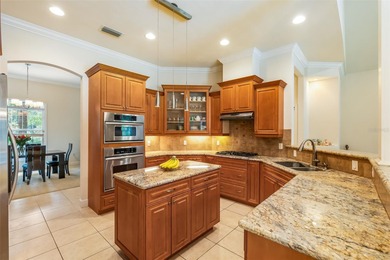 One or more photo(s) has been virtually staged. Elegant Pool on Haile Plantation Golf and Country Club in Florida - for sale on GolfHomes.com, golf home, golf lot