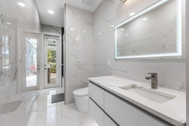 Welcome to this exquisitely renovated four-bedroom three bath on Stonebridge Golf and Country Club in Florida - for sale on GolfHomes.com, golf home, golf lot