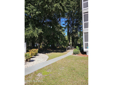 This is the one!  2 Bedroom, 2 Bath, 2nd Floor Condo with on Carolina Shores Golf Course in North Carolina - for sale on GolfHomes.com, golf home, golf lot