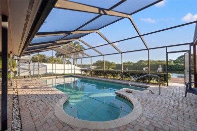 WATERFRONT POOL HOME with DIRECT BAY  GULF ACCESS in the GATED on Rocky Point Golf Course in Florida - for sale on GolfHomes.com, golf home, golf lot