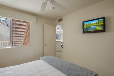 Ground floor 2 bedroom, 2 bath condo with a 1-car garage, being on London Bridge Golf Course in Arizona - for sale on GolfHomes.com, golf home, golf lot