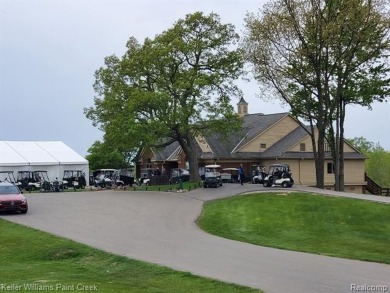 Experience the unparalleled lifestyle of living in a premier on Metamora Country Club in Michigan - for sale on GolfHomes.com, golf home, golf lot