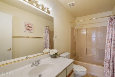 Ground floor 2 bedroom, 2 bath condo with a 1-car garage, being on London Bridge Golf Course in Arizona - for sale on GolfHomes.com, golf home, golf lot