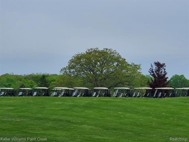 Experience the unparalleled lifestyle of living in a premier on Metamora Country Club in Michigan - for sale on GolfHomes.com, golf home, golf lot