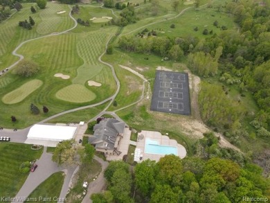 Experience the unparalleled lifestyle of living in a premier on Metamora Country Club in Michigan - for sale on GolfHomes.com, golf home, golf lot