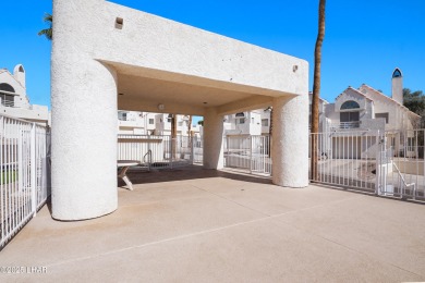 Ground floor 2 bedroom, 2 bath condo with a 1-car garage, being on London Bridge Golf Course in Arizona - for sale on GolfHomes.com, golf home, golf lot