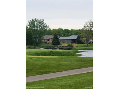 Experience the unparalleled lifestyle of living in a premier on Metamora Country Club in Michigan - for sale on GolfHomes.com, golf home, golf lot