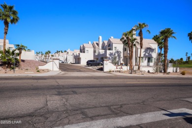 Ground floor 2 bedroom, 2 bath condo with a 1-car garage, being on London Bridge Golf Course in Arizona - for sale on GolfHomes.com, golf home, golf lot