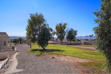 Ground floor 2 bedroom, 2 bath condo with a 1-car garage, being on London Bridge Golf Course in Arizona - for sale on GolfHomes.com, golf home, golf lot