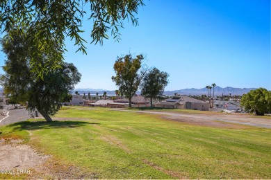 Ground floor 2 bedroom, 2 bath condo with a 1-car garage, being on London Bridge Golf Course in Arizona - for sale on GolfHomes.com, golf home, golf lot