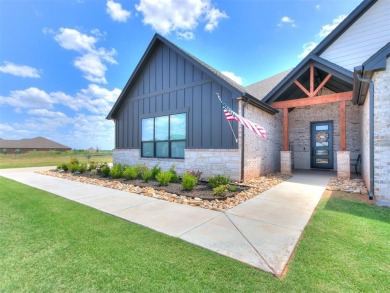 The neighborhood includes a pool, a golf course, a restaurant on Winter Creek Golf and Social Club in Oklahoma - for sale on GolfHomes.com, golf home, golf lot