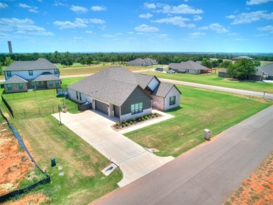 The neighborhood includes a pool, a golf course, a restaurant on Winter Creek Golf and Social Club in Oklahoma - for sale on GolfHomes.com, golf home, golf lot