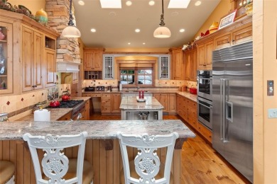 This remarkable home was curated for the nature lover, gardener on Raven Golf Club At Three Peaks in Colorado - for sale on GolfHomes.com, golf home, golf lot