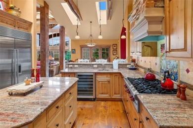 This remarkable home was curated for the nature lover, gardener on Raven Golf Club At Three Peaks in Colorado - for sale on GolfHomes.com, golf home, golf lot