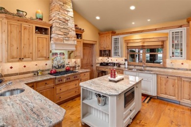 This remarkable home was curated for the nature lover, gardener on Raven Golf Club At Three Peaks in Colorado - for sale on GolfHomes.com, golf home, golf lot