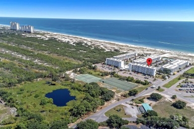 Newly renovated and furnished beachside condo is located in on Kiva Dunes Golf Club in Alabama - for sale on GolfHomes.com, golf home, golf lot