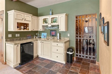 This remarkable home was curated for the nature lover, gardener on Raven Golf Club At Three Peaks in Colorado - for sale on GolfHomes.com, golf home, golf lot