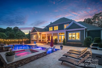 Situated on 1.64 acres w/golf course views, this home offers on Trump National Golf Club Charlotte in North Carolina - for sale on GolfHomes.com, golf home, golf lot