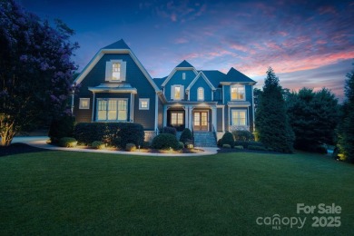 Situated on 1.64 acres w/golf course views, this home offers on Trump National Golf Club Charlotte in North Carolina - for sale on GolfHomes.com, golf home, golf lot