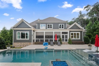 Situated on 1.64 acres w/golf course views, this home offers on Trump National Golf Club Charlotte in North Carolina - for sale on GolfHomes.com, golf home, golf lot