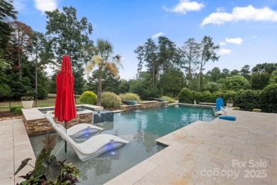 Situated on 1.64 acres w/golf course views, this home offers on Trump National Golf Club Charlotte in North Carolina - for sale on GolfHomes.com, golf home, golf lot