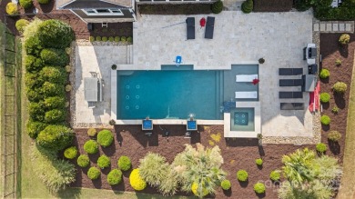 Situated on 1.64 acres w/golf course views, this home offers on Trump National Golf Club Charlotte in North Carolina - for sale on GolfHomes.com, golf home, golf lot