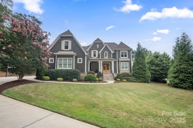 Situated on 1.64 acres w/golf course views, this home offers on Trump National Golf Club Charlotte in North Carolina - for sale on GolfHomes.com, golf home, golf lot