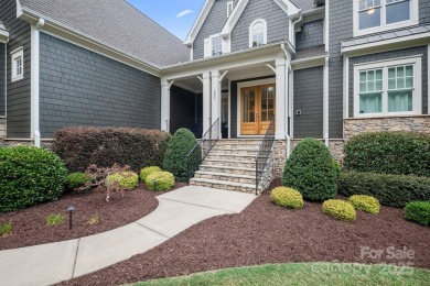 Situated on 1.64 acres w/golf course views, this home offers on Trump National Golf Club Charlotte in North Carolina - for sale on GolfHomes.com, golf home, golf lot