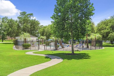 Discover refined coastal living at 4679 Wild Iris Drive, Unit on Myrtlewood Golf Course and Club  in South Carolina - for sale on GolfHomes.com, golf home, golf lot