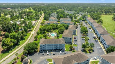 Discover refined coastal living at 4679 Wild Iris Drive, Unit on Myrtlewood Golf Course and Club  in South Carolina - for sale on GolfHomes.com, golf home, golf lot