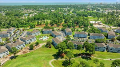 Discover refined coastal living at 4679 Wild Iris Drive, Unit on Myrtlewood Golf Course and Club  in South Carolina - for sale on GolfHomes.com, golf home, golf lot