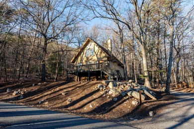 Escape to comfort and nature in this inviting 2BR/2BA bungalow on Woodstone Meadows Golf Course At Massanutten in Virginia - for sale on GolfHomes.com, golf home, golf lot