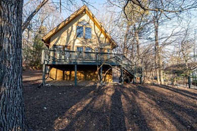 Escape to comfort and nature in this inviting 2BR/2BA bungalow on Woodstone Meadows Golf Course At Massanutten in Virginia - for sale on GolfHomes.com, golf home, golf lot