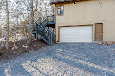 Escape to comfort and nature in this inviting 2BR/2BA bungalow on Woodstone Meadows Golf Course At Massanutten in Virginia - for sale on GolfHomes.com, golf home, golf lot