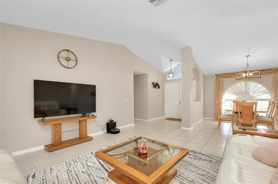 Welcome to this beautifully updated pool home on a spacious on Port Charlotte Golf Club in Florida - for sale on GolfHomes.com, golf home, golf lot