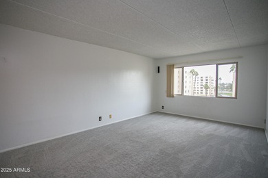 Overlooking a sparkling pool, this stylish open concept, N/S on Scottsdale Shadows in Arizona - for sale on GolfHomes.com, golf home, golf lot