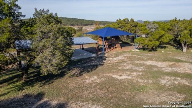 Nestled in a serene setting, this classic rustic home in the on Canyon Lake Golf Club in Texas - for sale on GolfHomes.com, golf home, golf lot