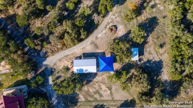 Nestled in a serene setting, this classic rustic home in the on Canyon Lake Golf Club in Texas - for sale on GolfHomes.com, golf home, golf lot