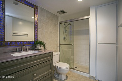 Overlooking a sparkling pool, this stylish open concept, N/S on Scottsdale Shadows in Arizona - for sale on GolfHomes.com, golf home, golf lot