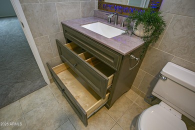 Overlooking a sparkling pool, this stylish open concept, N/S on Scottsdale Shadows in Arizona - for sale on GolfHomes.com, golf home, golf lot