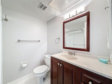 Discover this charming two-bedroom, two-bathroom condo in the on East Bay Golf Club in Florida - for sale on GolfHomes.com, golf home, golf lot