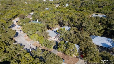 Nestled in a serene setting, this classic rustic home in the on Canyon Lake Golf Club in Texas - for sale on GolfHomes.com, golf home, golf lot